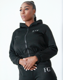Side view of set with hoodie half-zipped
