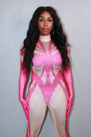 Model wearing Dakota rhinestone jumpsuit in pink front view