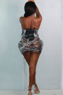 Back view of DESIRE two-piece outfit on model