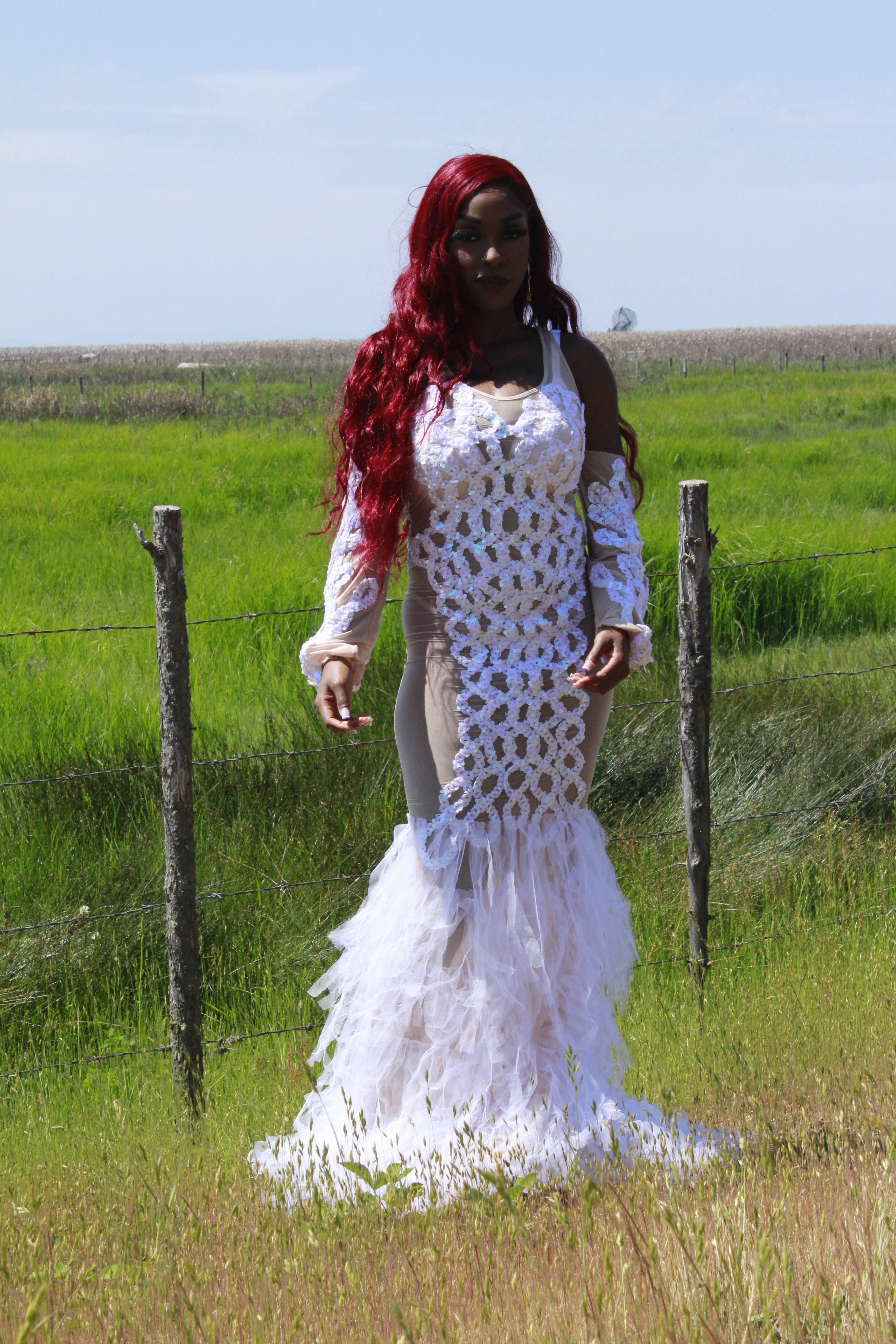 Full-length shot highlighting figure-hugging silhouette of LYNA dress