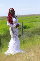 Side view showing alluring sheer fabric panels of LYNA dress